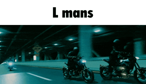 two people riding motorcycles in a tunnel with the words " l mans " on the bottom