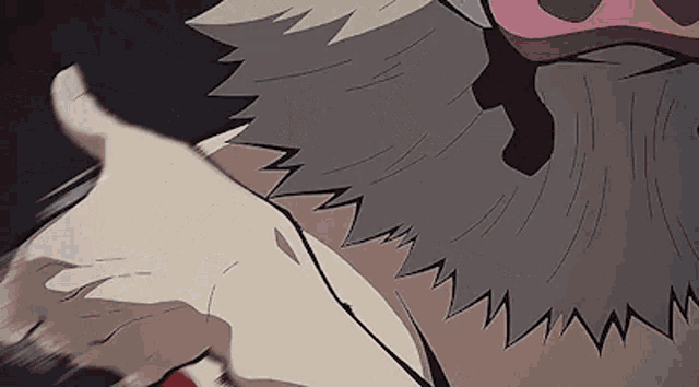 a close up of a cartoon character 's face with a beard and a sharp tooth .