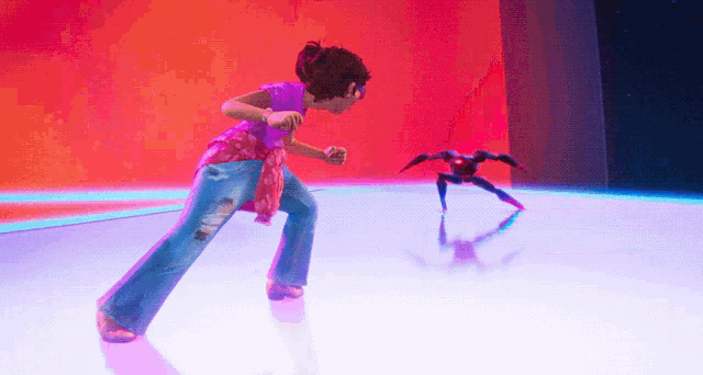 a girl in a purple shirt and blue jeans is standing in front of a spider