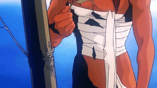 a person with a bandage on their chest is standing next to a pole