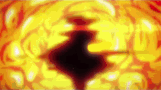 a close up of a yellow and red background with a black hole in the middle