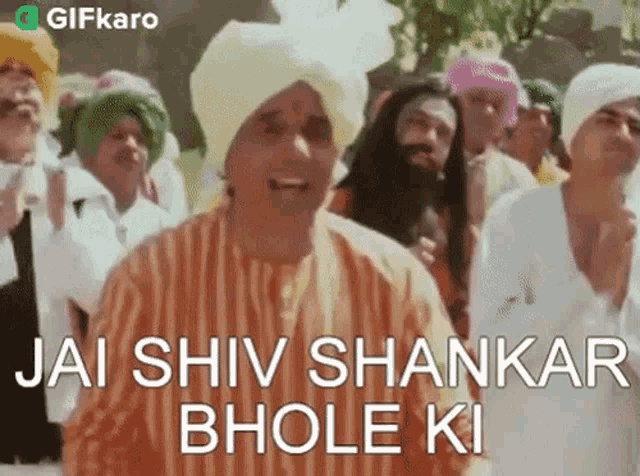 a man wearing a turban is standing in front of a crowd and says jai shiva shankar bhole ki