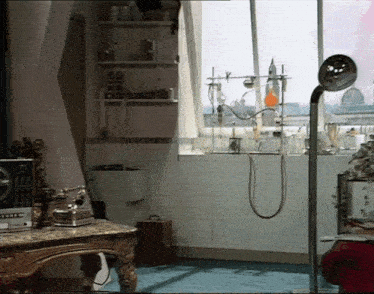 a room with a table and a clock that says ' abc '