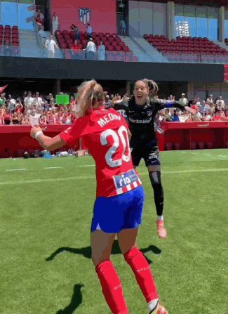 a female soccer player with the number 22 on her jersey