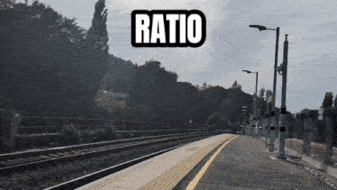 a train station with the word ratio above the tracks