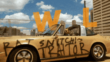 a yellow car with graffiti on it that says " rat snitch "
