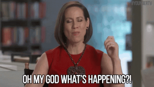 a woman in a red dress says oh my god what 's happening ?