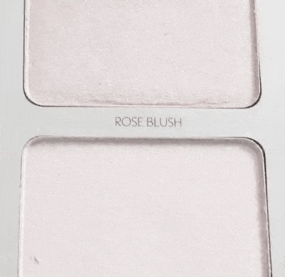 a close up of a palette of makeup with the words `` rose blush '' on it .
