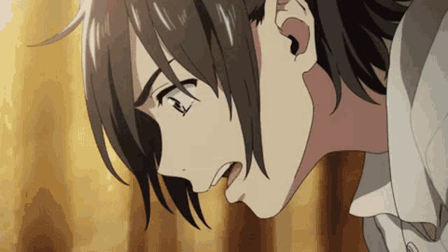 a close up of a person 's face with a very serious look on their face