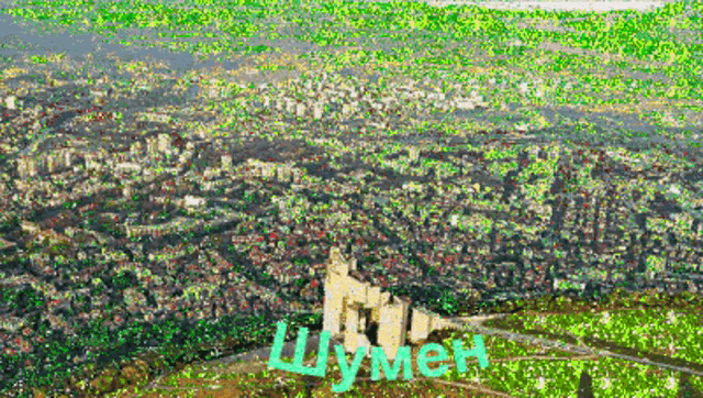 an aerial view of a city with the word lymen written in blue
