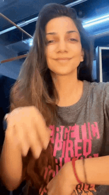 a woman wearing a t-shirt that says ' argentina ' on it