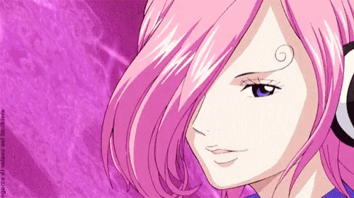 a close up of a girl with pink hair and blue eyes