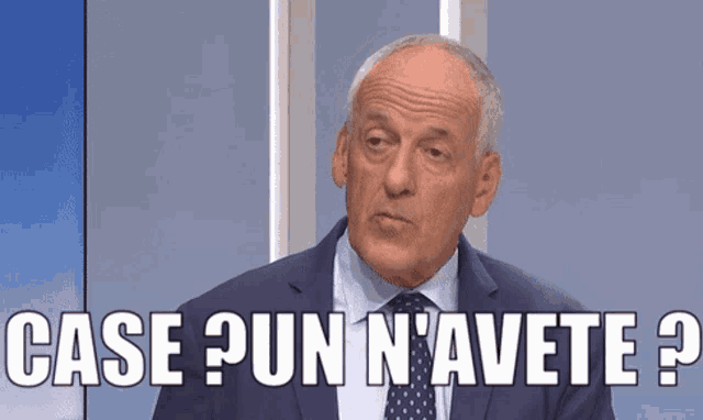 a man in a suit and tie says " case pun n'avete "
