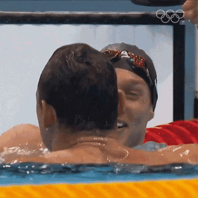 Hug Caeleb Dressel GIF - Hug Caeleb Dressel Usa Swimming Team GIFs