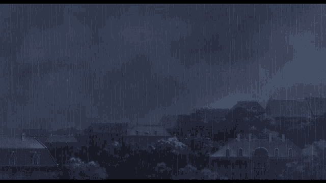 a dark night with a lot of rain falling