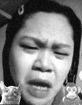 a black and white photo of a woman making a funny face with a cat and a monkey .