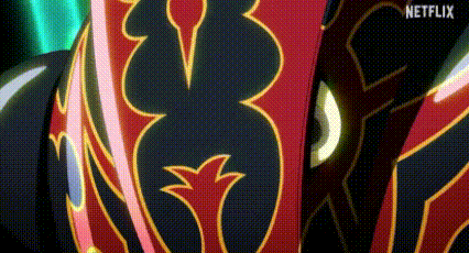a close up of a cartoon character 's face with a red and black armor .