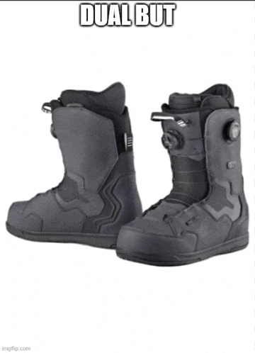 a pair of black snowboard boots with the words dual but on the bottom