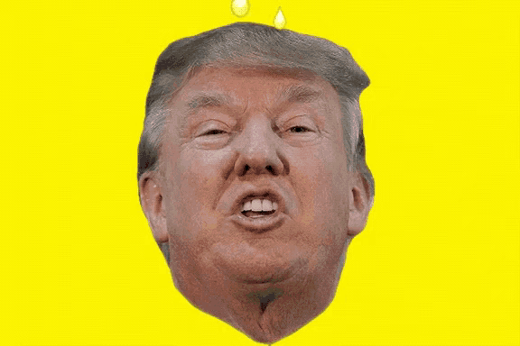 a close up of donald trump 's face with yellow drops on it