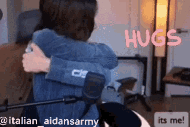 a woman hugging another woman with the words hugs written on the bottom