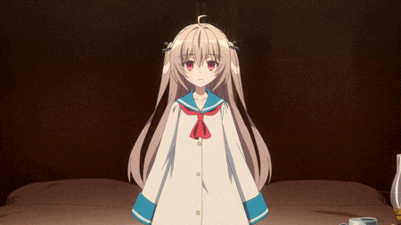 a girl with pigtails is smiling with her hands on her chin