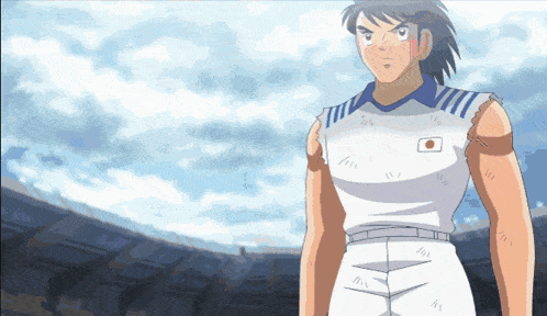 a man in a soccer uniform with a japanese flag on his chest