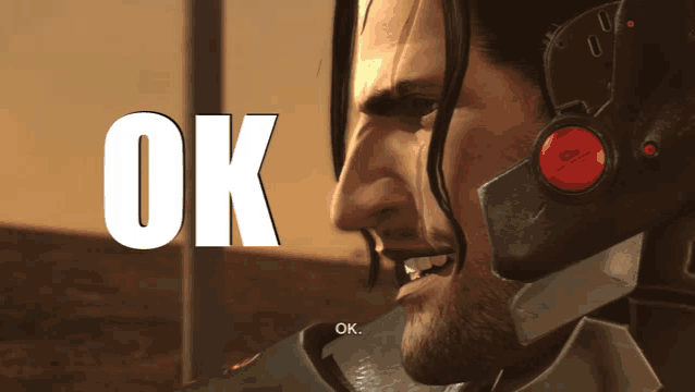 a close up of a man 's face with the word ok on the bottom