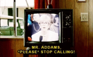 a mr. addams sign is above a television