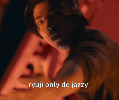 a close up of a man 's face with the words ryuji only de jazzy below it