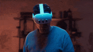 a man wearing a virtual reality headset with three buttons on the side