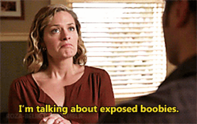 a woman is talking about exposed boobies