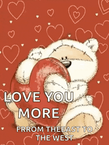 a teddy bear is holding a red heart with the words love you more from the east to the west