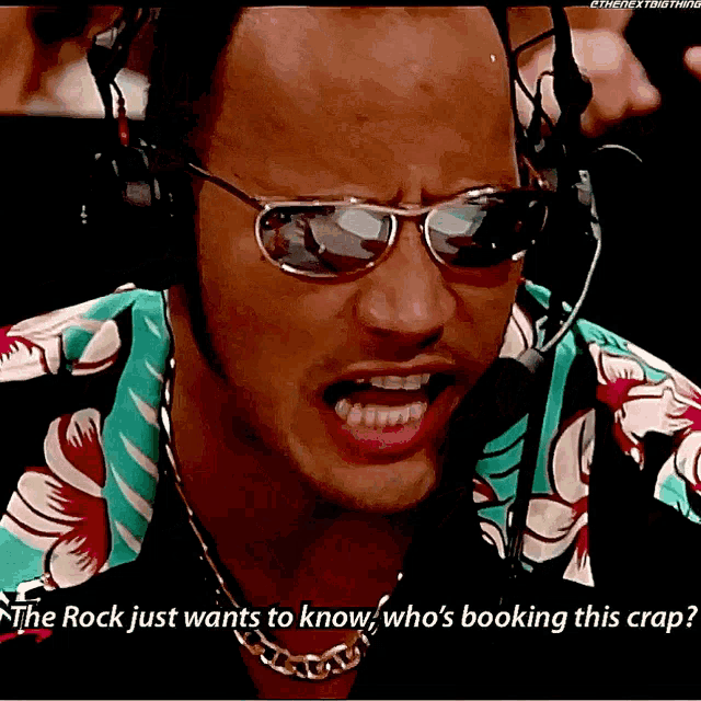a man wearing sunglasses and a headset says " the rock just wants to know who 's booking this crap "