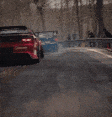 a red race car with drifter written on the side