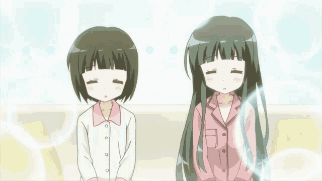 two anime girls with their eyes closed are sitting next to each other on a couch