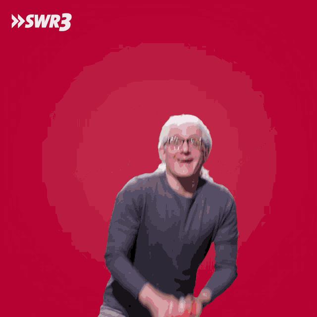 a blurry picture of a person with a swr3 logo in the corner