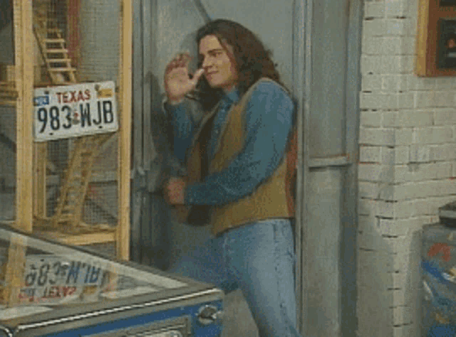 a man with a texas license plate 983wjb