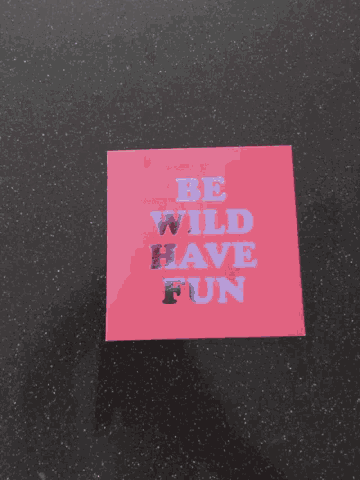 a card that says be wild have fun is surrounded by white confetti