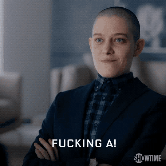 a woman in a suit says fucking a