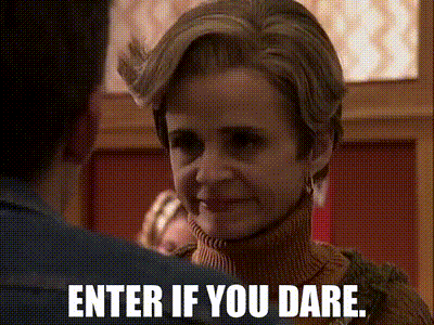 a woman is talking to a man and the words enter if you dare are on the screen