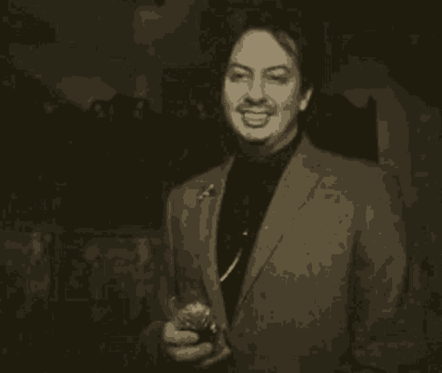 a man in a suit says oh no thank you in a black and white photo