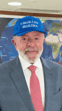 a man wearing a blue hat that says brasileiros