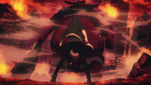 a man is standing in front of a giant red monster