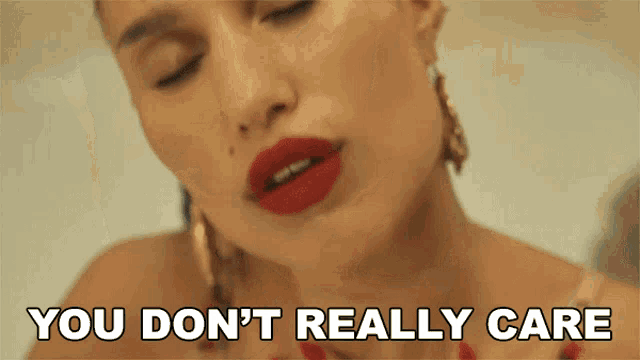 a close up of a woman 's face with the words " you don 't really care " above her