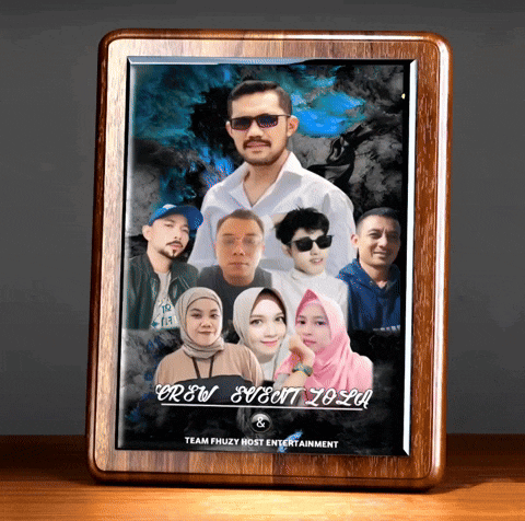 a wooden frame with a picture of a group of people and the words team phuzzy host entertainment on the bottom