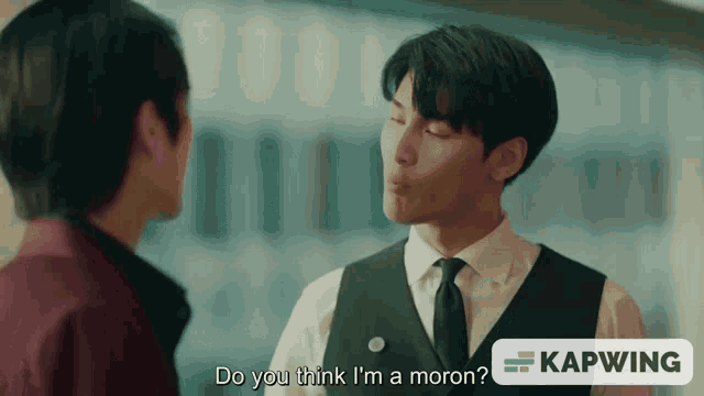 a man talking to another man with the caption do you think i 'm a moron