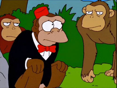 a cartoon monkey wearing a bow tie and a top hat