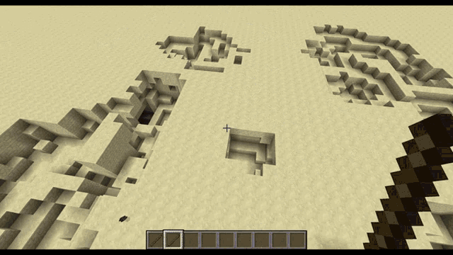 a screenshot of a minecraft game with a cross in the middle of the desert