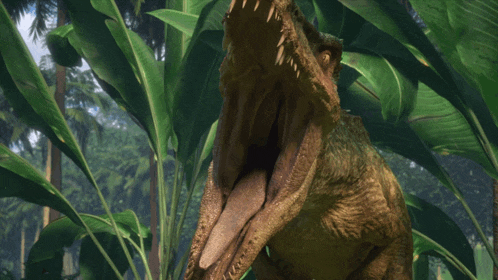 a dinosaur with its mouth open is surrounded by leaves