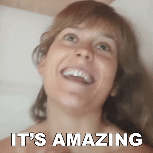 a woman is smiling with the words " it 's amazing " above her